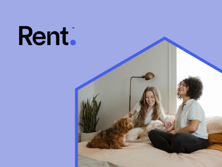 happy women and dog on bed