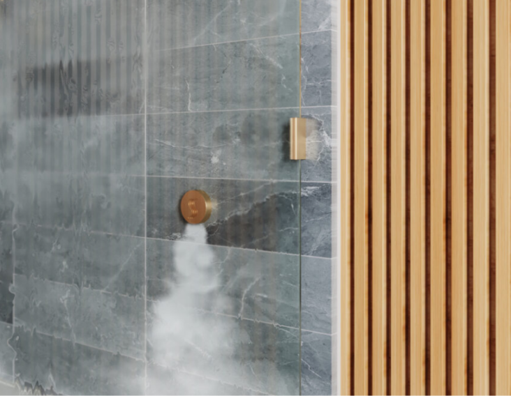 A shower with ThermaSol's SteamVection steamhead in gold