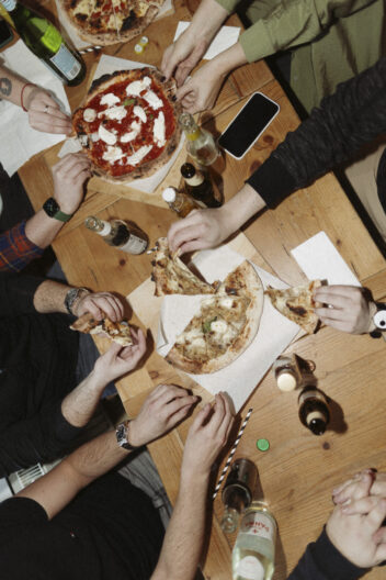 Overhead view of a web developer pizza party