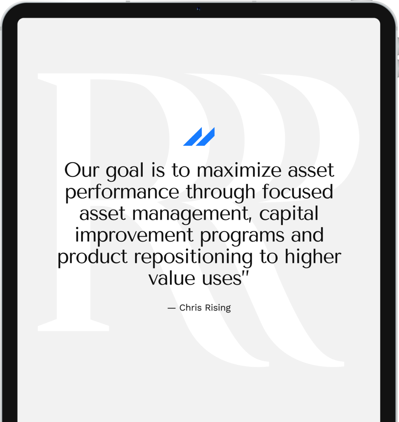 Rising Realty Partners asset management statement displayed on a tablet.