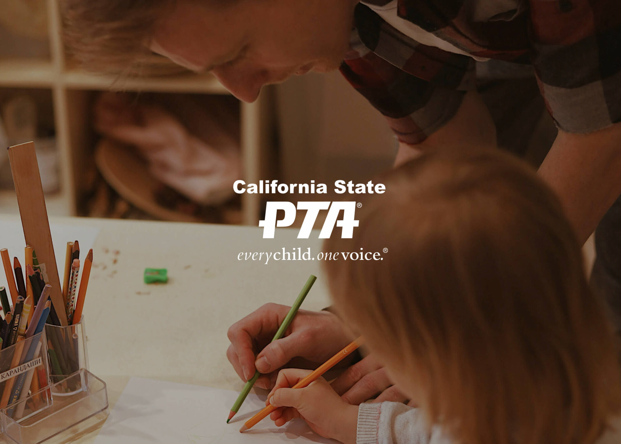 California State PTA website featuring an adult and child drawing together.